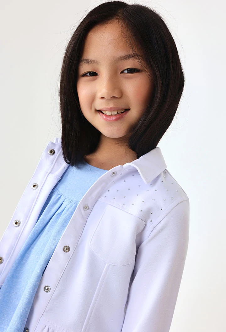 Knitted jacket for baby girl in white colour