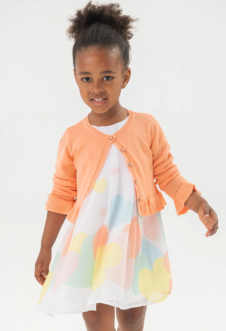 Giacca in maglia per neonato bambina di colore arancione.