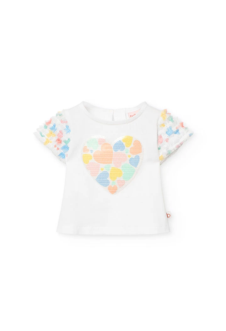 T-shirt en maille pour bébé fille de couleur blanche avec un imprimé de coeur.