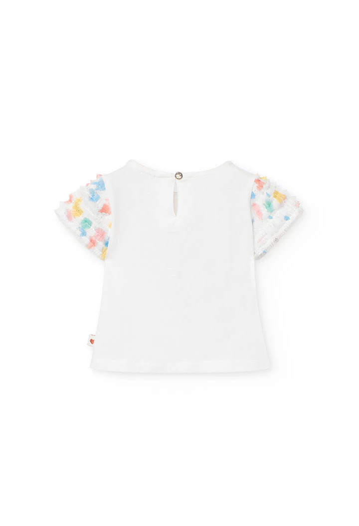 T-shirt en maille pour bébé fille de couleur blanche avec un imprimé de coeur.