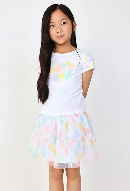 Maglietta in maglia per bambina in colore bianco con stampa a cuore.
