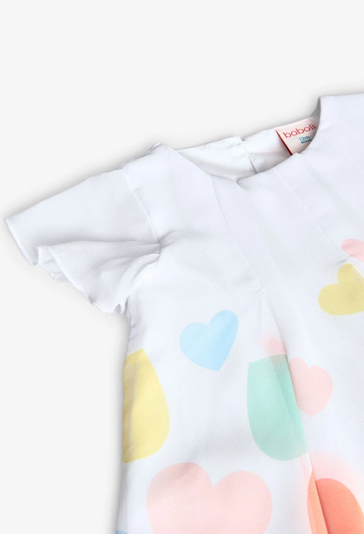 Robe en mousseline pour bébé fille de couleur blanche
