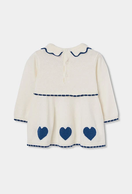 White knitted baby dress with blue hearts
