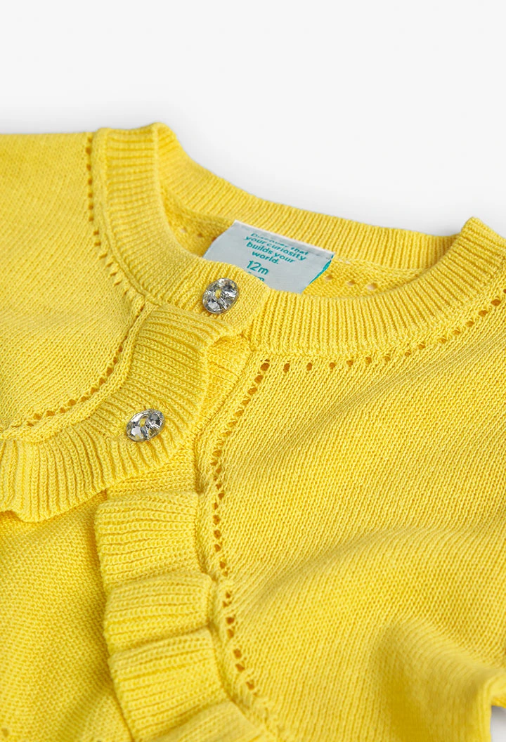 Casaco tricotado de bebé menina em amarelo