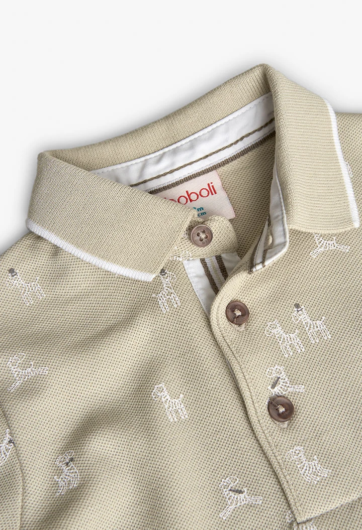 Pólo piqué para bebé menino com estampado de zebras em cor bege