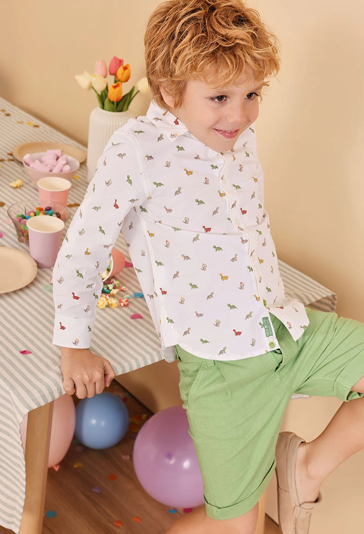 Camisa de popelina de bebé estampada em branco com motivo de dinossauros