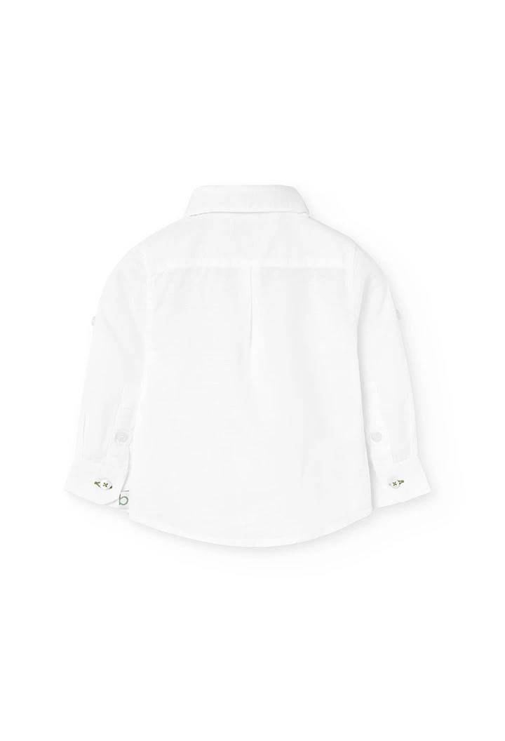 Chemise en lin pour bébé garçon de couleur blanche à manches longues.