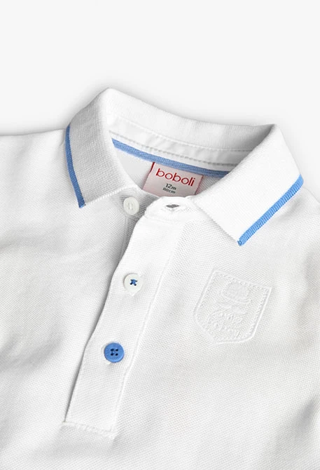 Polo piqué per bambino in colore bianco.