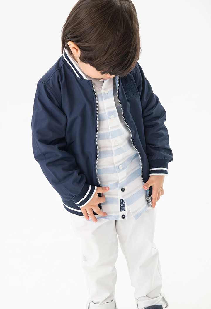 Giubbotto reversibile per bambino color blu navy.