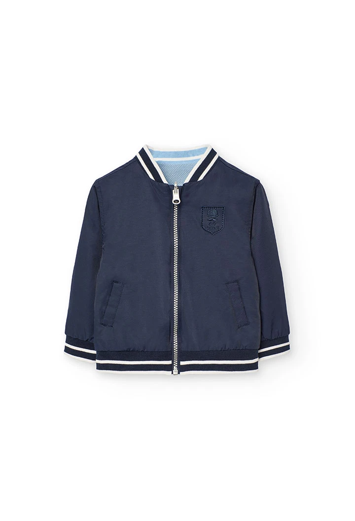 Giubbotto reversibile per bambino color blu navy.