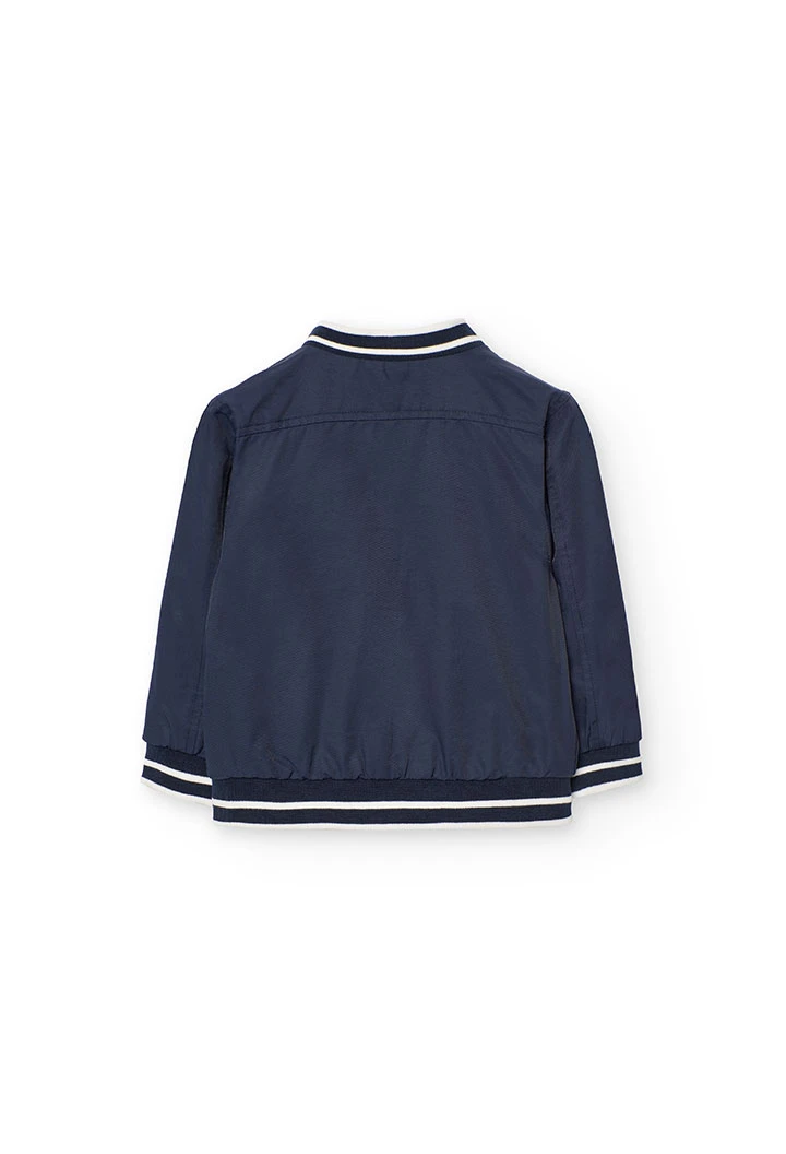 Giubbotto reversibile per bambino color blu navy.