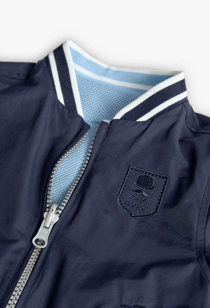 Giubbotto reversibile per bambino color blu navy.