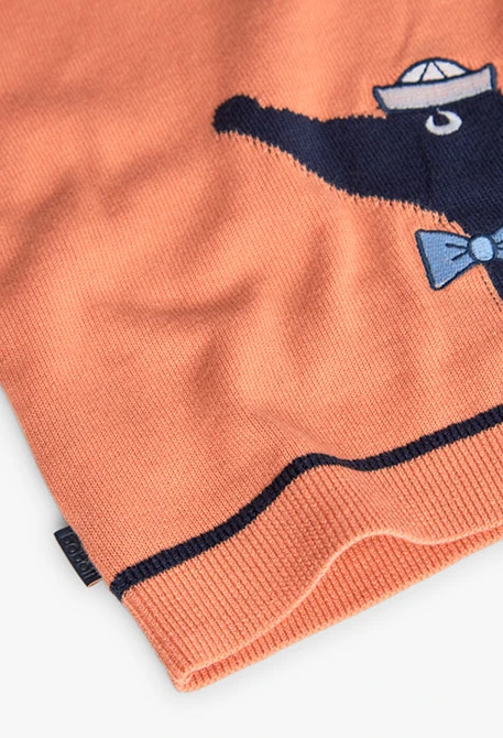 Knitted jumper for baby boy in orange colour