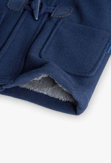 Trenca nen blau marí