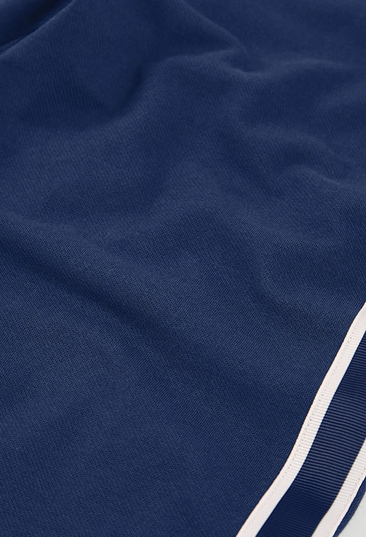 Calças azuis para menina