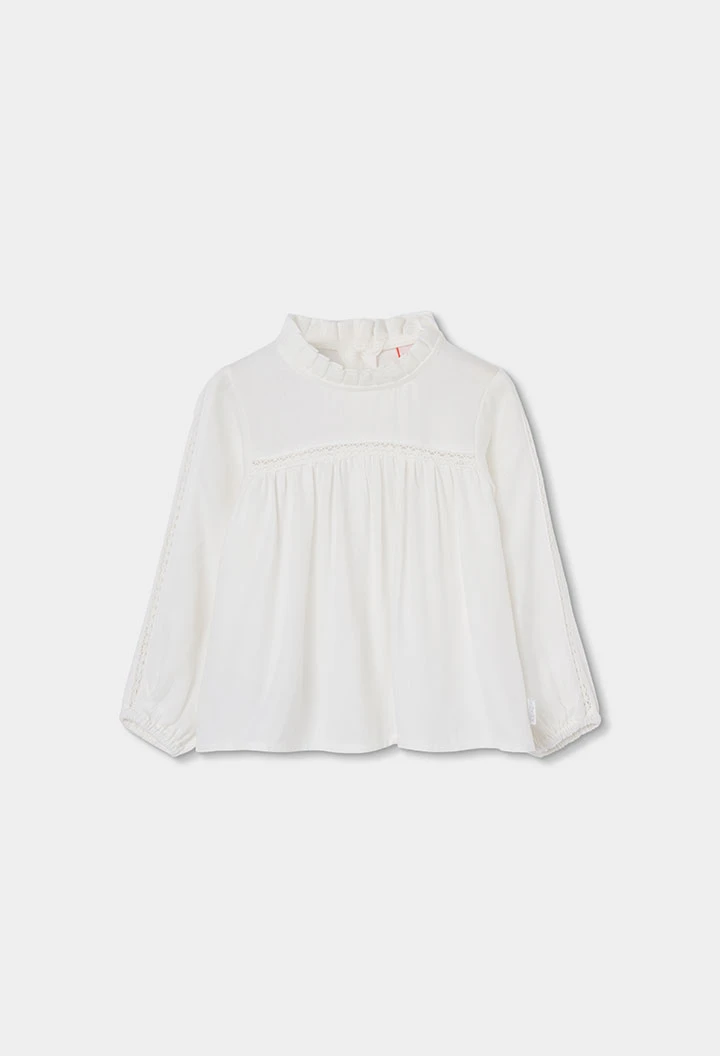 Blouse blanche avec dentelle et col froncé