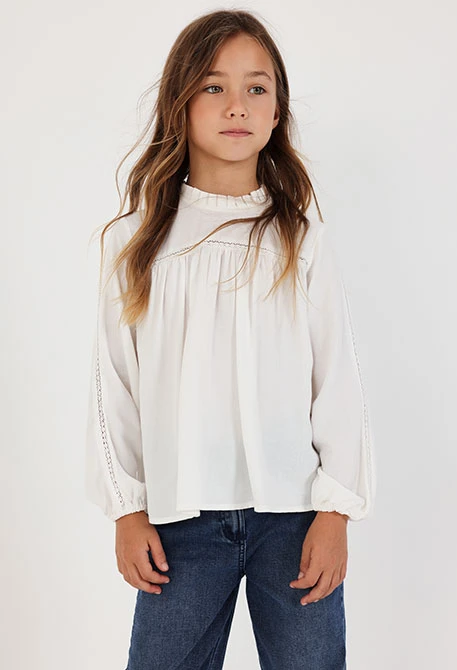 White blouse with lace and gathered neckline