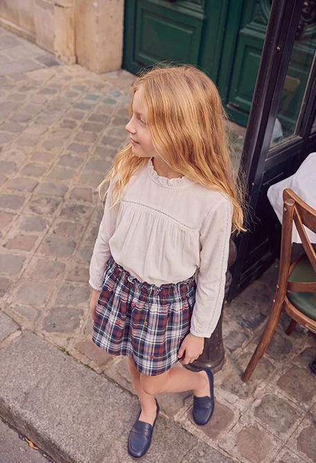 White blouse with lace and gathered neckline