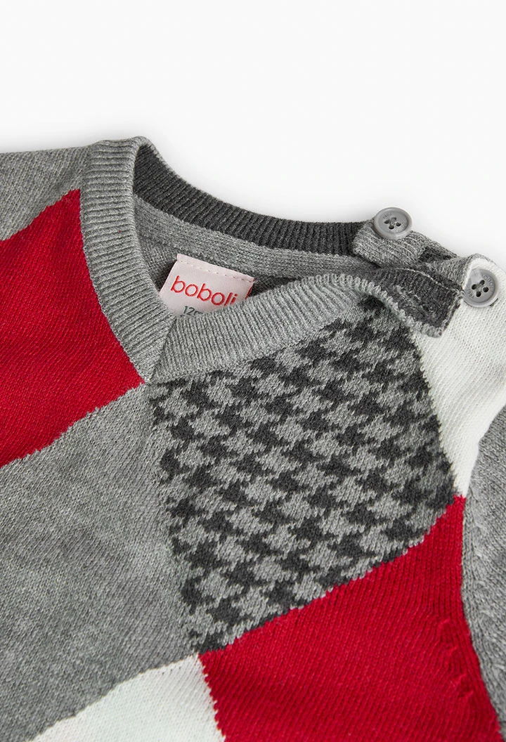 Knitted jumper for baby boy with diamond pattern