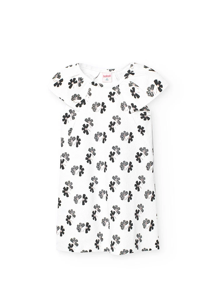 Abito in maglia per bambina con design floreale in bianco e nero.