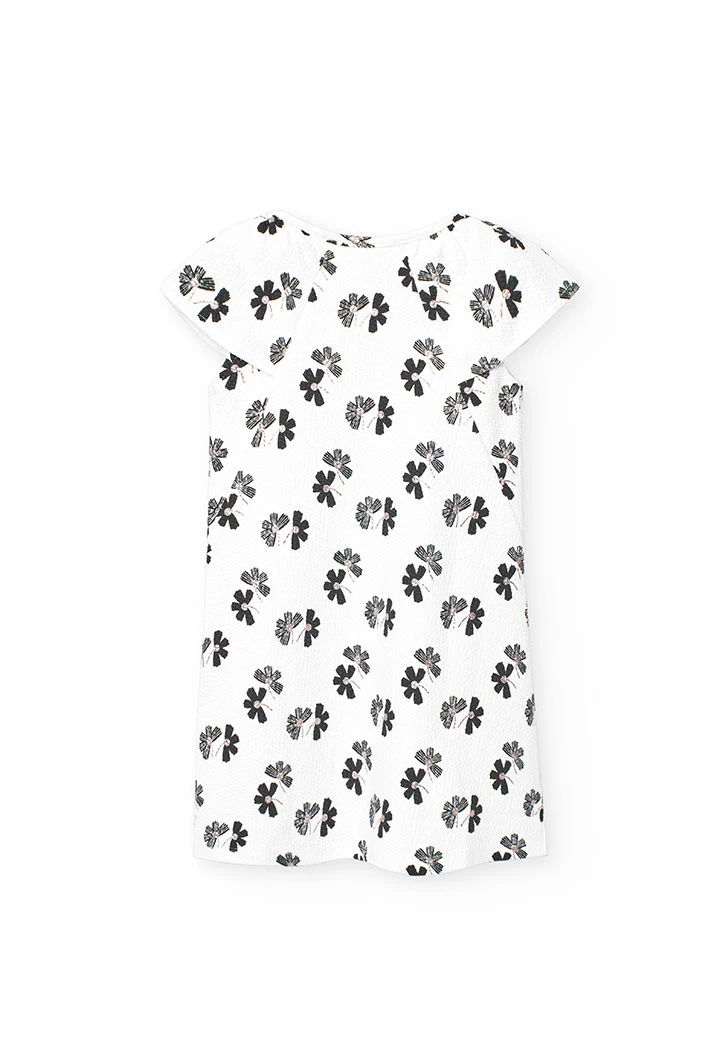 Abito in maglia per bambina con design floreale in bianco e nero.