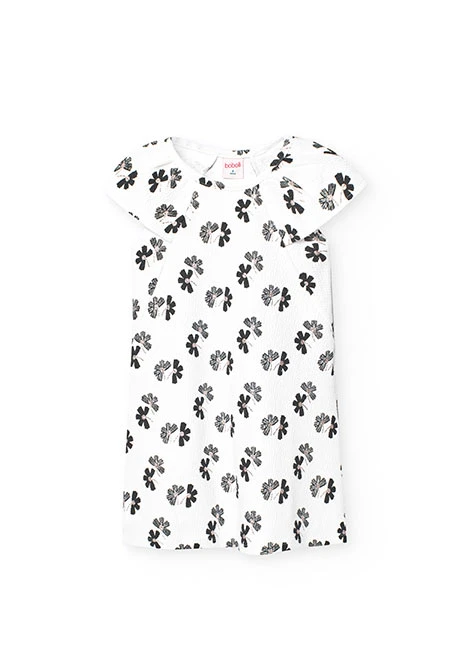 Abito in maglia per bambina con design floreale in bianco e nero.