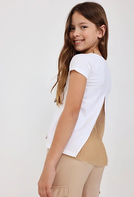 Maglietta a maglia per bambina di colore bianco con disegno di un fiore