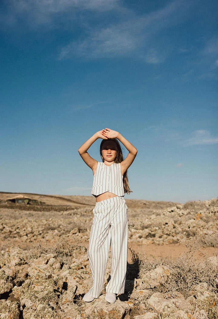 Pantalon en maille pour fille rayé en blanc et noir