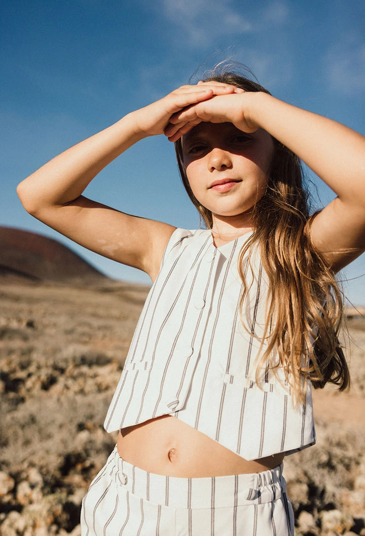 Gilet en maille pour fille rayé en blanc et noir