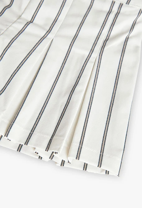 Gonna-pantaloncino in maglia per bambina con righe in bianco e nero.