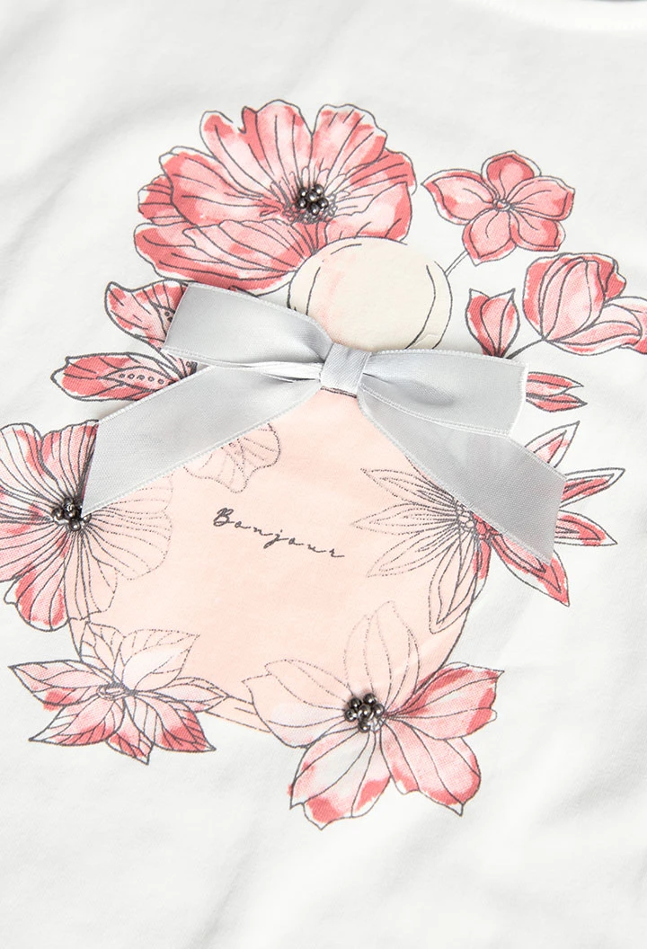 T-shirt en tricot pour fille en blanc avec motif de fleurs.