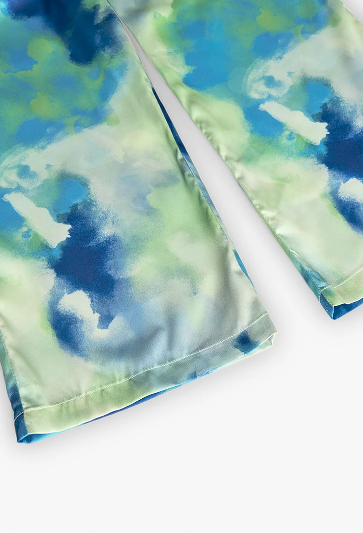 Calças largas de cetim para menina com estampado em azul e verde