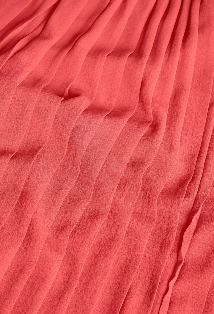 Pantalone di chiffon plissettato per bambina di colore rosso