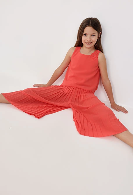 Pantalon en mousseline plissée pour fille de couleur rouge