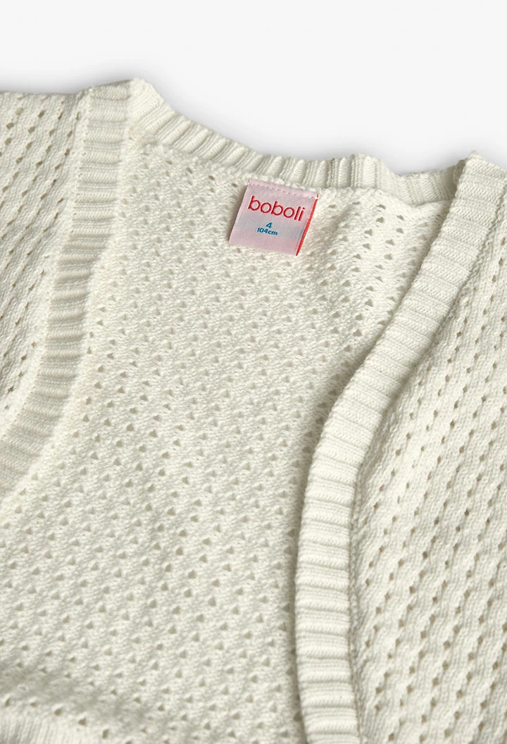 Giacca tricotosa per bambina di colore bianco.