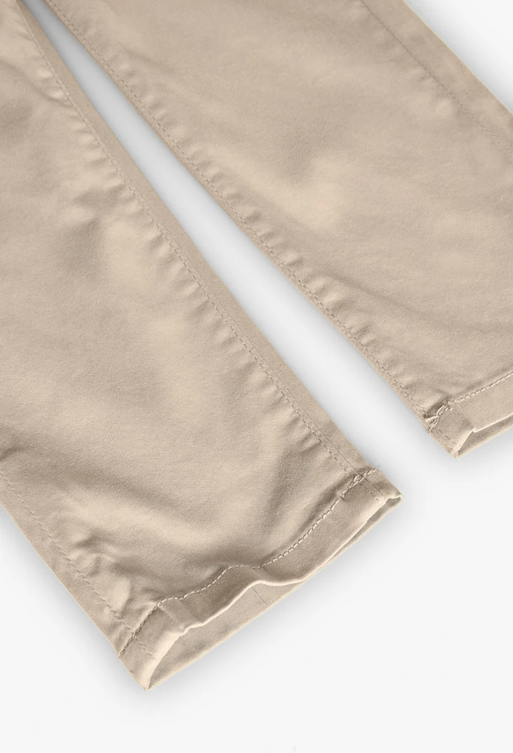 Pantaloni di raso per bambino in colore beige