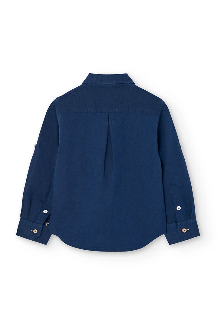 Camisa de lli per a nen en color blau marí de màniga llarga.