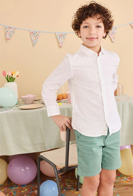 Bermuda in raso per bambino di colore verde