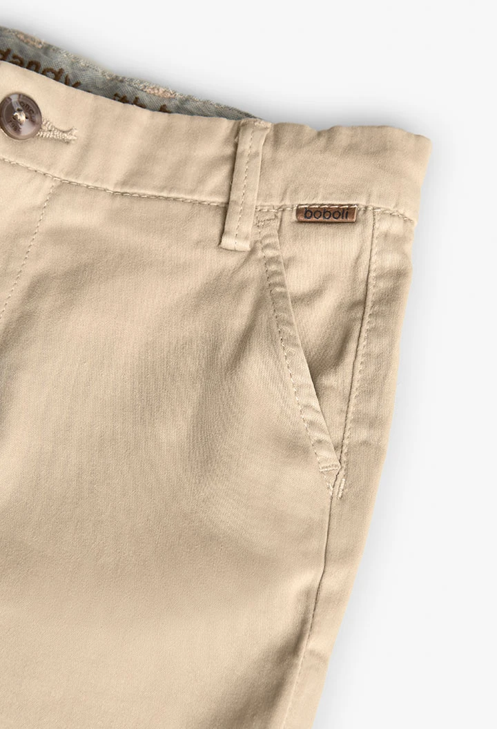 Bermudas de cetim para criança em cor bege