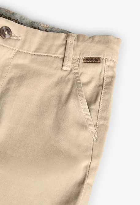 Bermuda di raso per bambino in colore beige