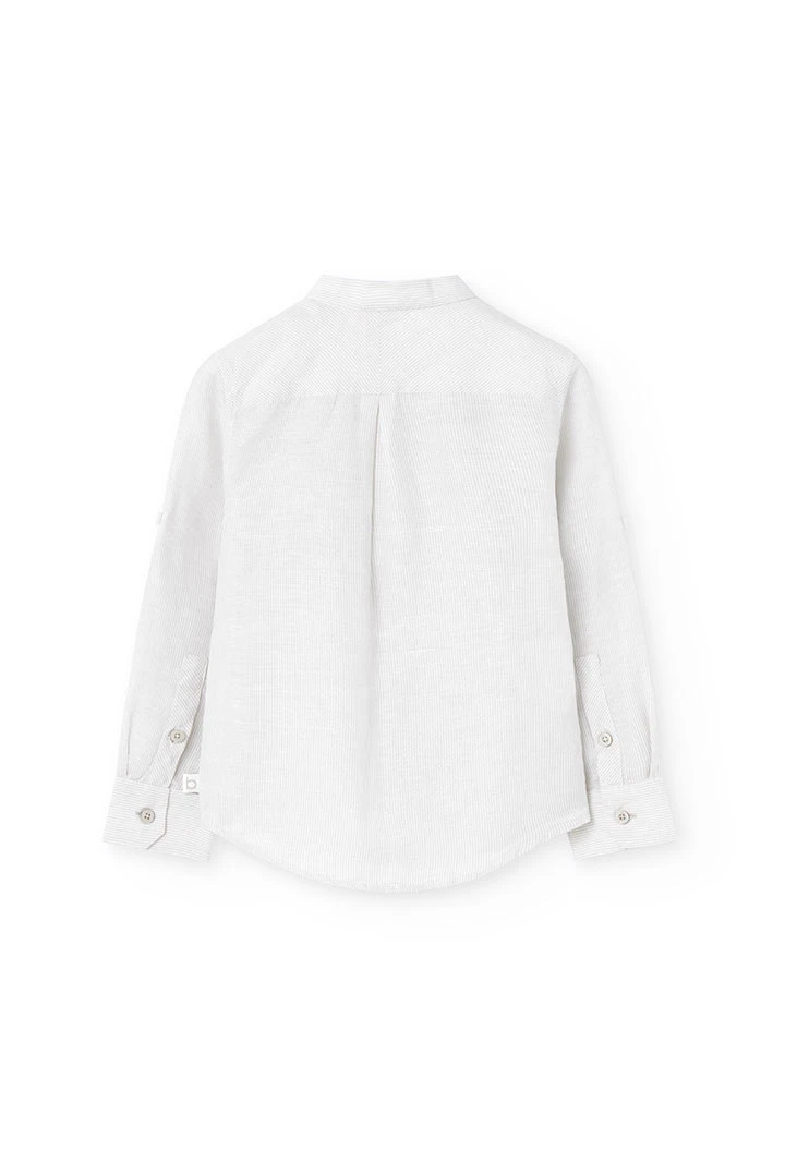 Chemise en lin pour enfant de couleur blanche.