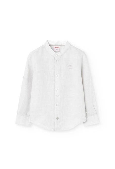 Chemise en lin pour enfant de couleur blanche.