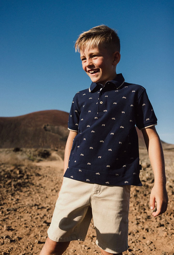 Polo piqué para criança com estampado em azul-marinho