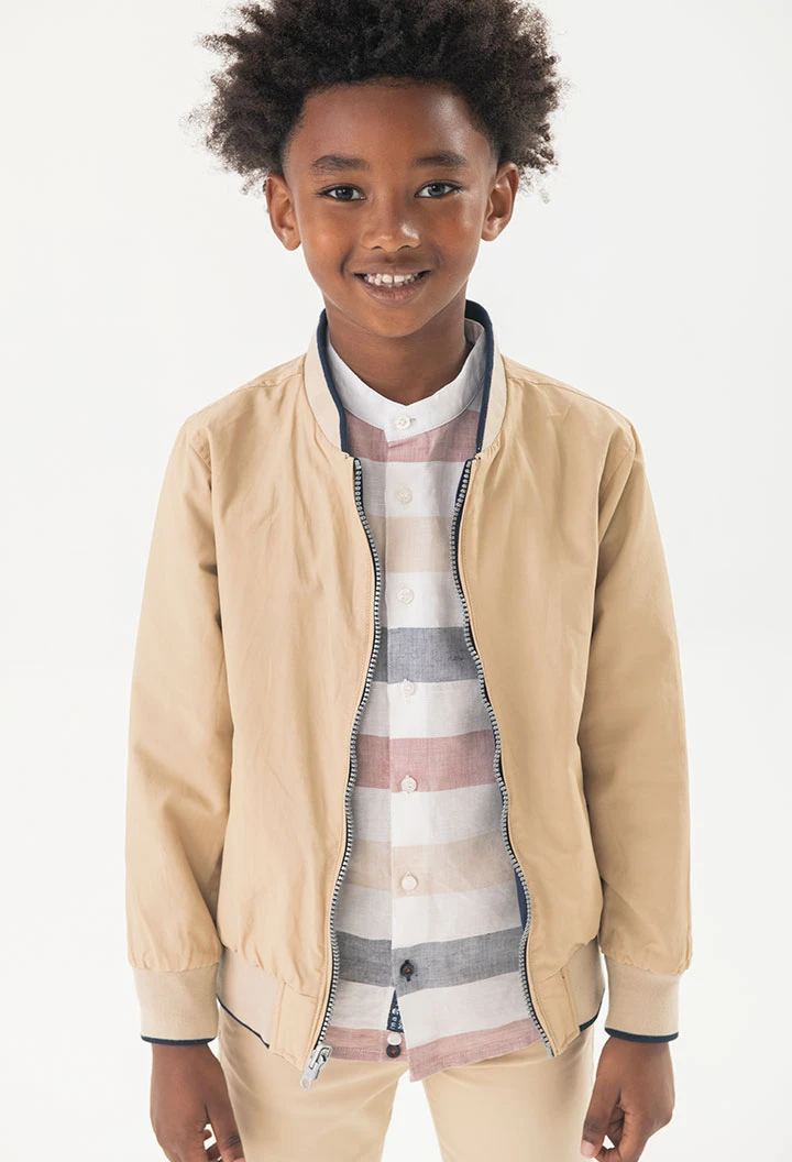 Reversible jacket for boys in navy blue and beige