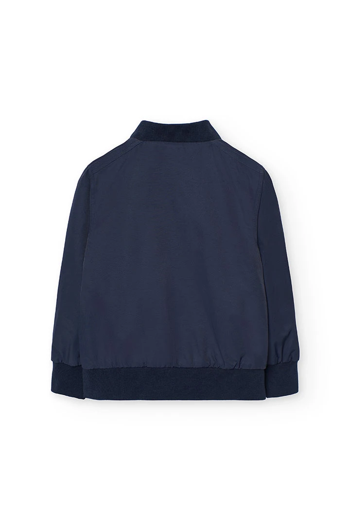 Reversible jacket for boys in navy blue and beige