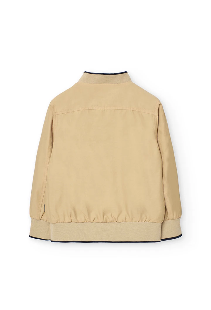 Reversible jacket for boys in navy blue and beige