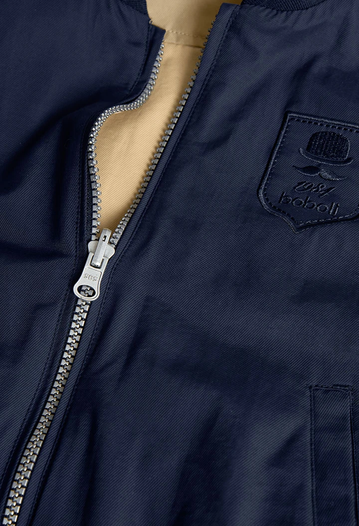 Reversible jacket for boys in navy blue and beige