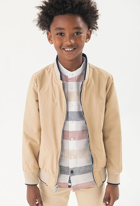 Reversible jacket for boys in navy blue and beige