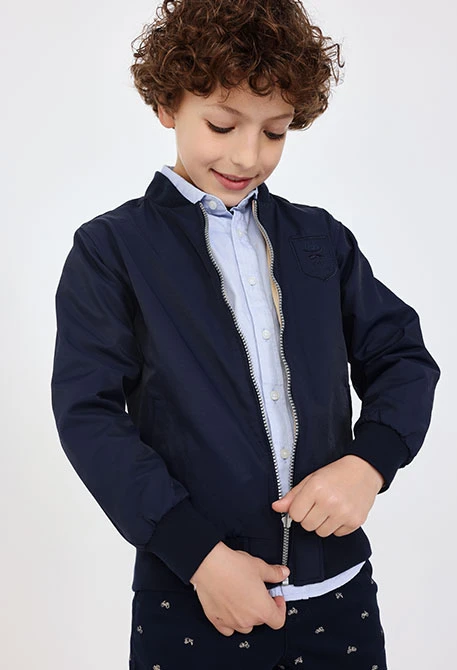 Giacca reversibile per bambino in blu navy e beige