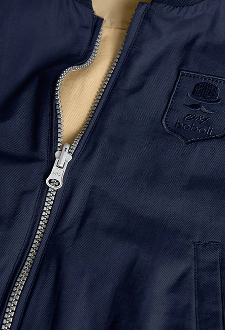 Reversible jacket for boys in navy blue and beige